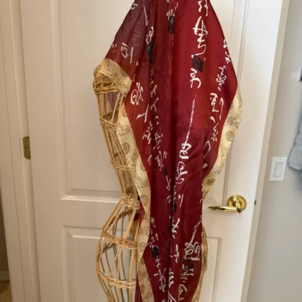 Vintage 100% silk rust and gold oblong scarf.